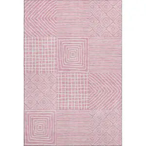 Photo of Pink And Ivory Geometric Washable Area Rug With UV Protection