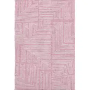 Photo of Pink And Ivory Geometric Washable Area Rug With UV Protection