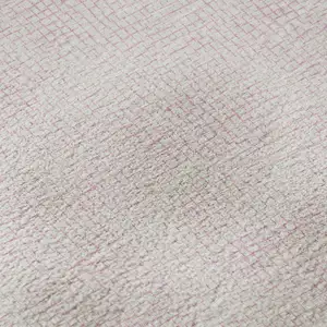 Photo of Pink And Ivory Geometric Washable Area Rug With UV Protection