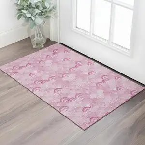 Photo of Pink And Ivory Geometric Washable Area Rug With UV Protection