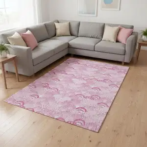 Photo of Pink And Ivory Geometric Washable Area Rug With UV Protection