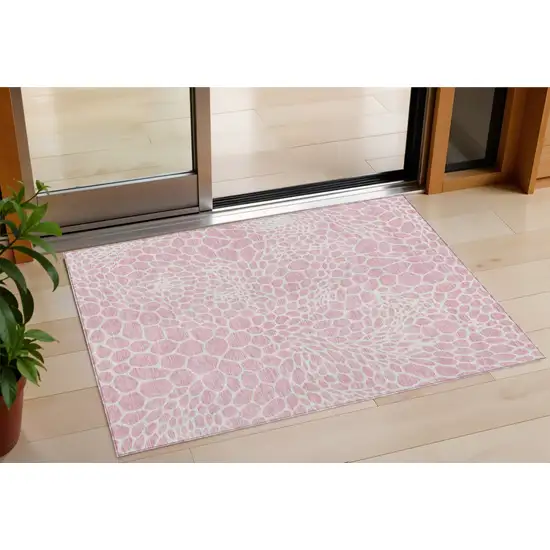 Pink And Ivory Geometric Washable Indoor Outdoor Area Rug Photo 1