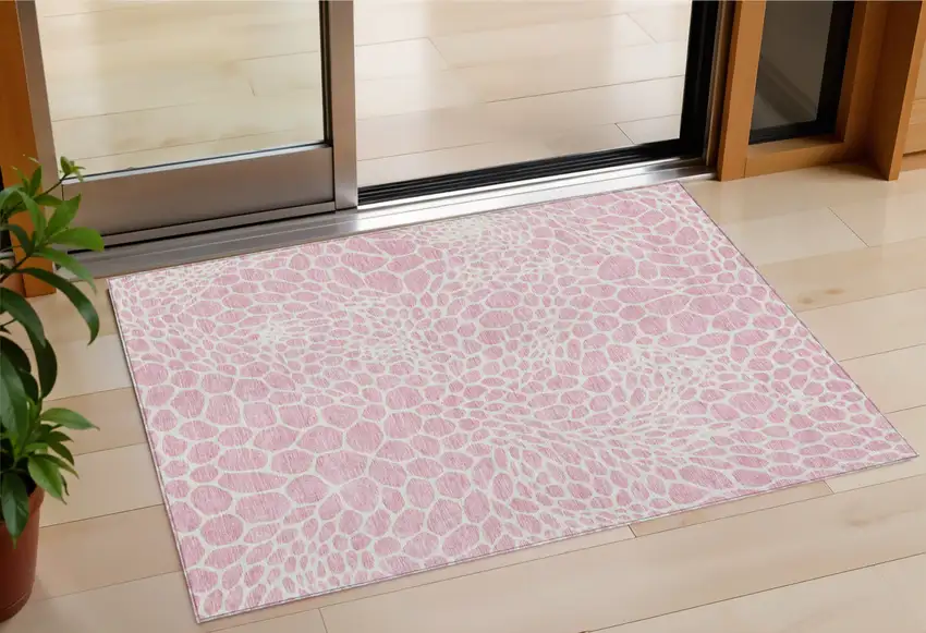 Pink And Ivory Geometric Washable Indoor Outdoor Area Rug Photo 1
