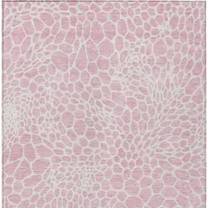 Photo of Pink And Ivory Geometric Washable Indoor Outdoor Area Rug