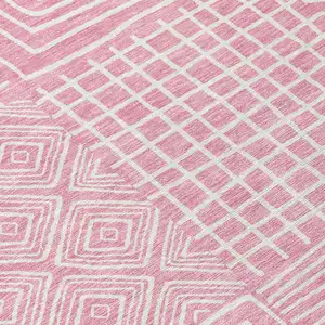 Photo of Pink And Ivory Geometric Washable Indoor Outdoor Area Rug