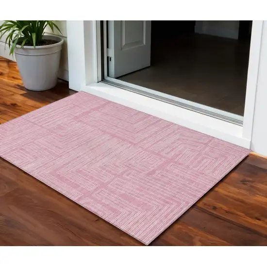 Pink And Ivory Geometric Washable Indoor Outdoor Area Rug Photo 1