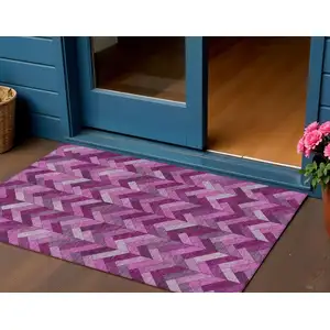 Photo of Pink And Ivory Geometric Washable Indoor Outdoor Area Rug