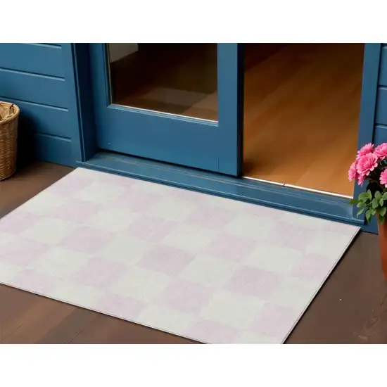 Pink And Ivory Geometric Washable Indoor Outdoor Area Rug Photo 1