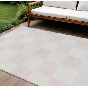 Photo of Pink And Ivory Geometric Washable Indoor Outdoor Area Rug