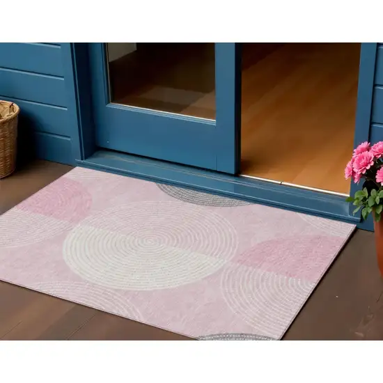 Pink And Ivory Geometric Washable Indoor Outdoor Area Rug Photo 1