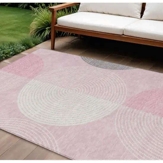 Pink And Ivory Geometric Washable Indoor Outdoor Area Rug Photo 1