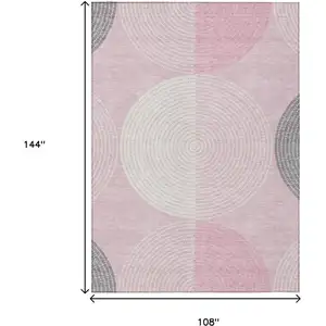 Photo of Pink And Ivory Geometric Washable Indoor Outdoor Area Rug