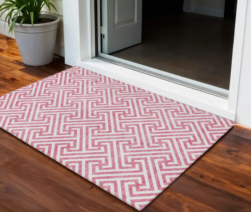 Pink And Ivory Geometric Washable Indoor Outdoor Area Rug Photo 1