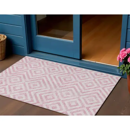 Pink And Ivory Geometric Washable Indoor Outdoor Area Rug Photo 1