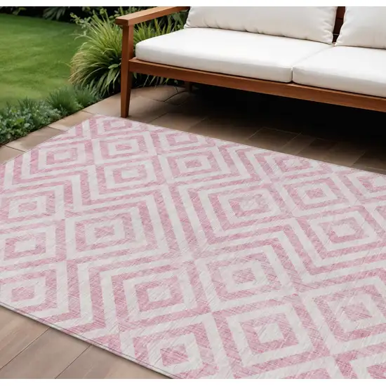 Pink And Ivory Geometric Washable Indoor Outdoor Area Rug Photo 1