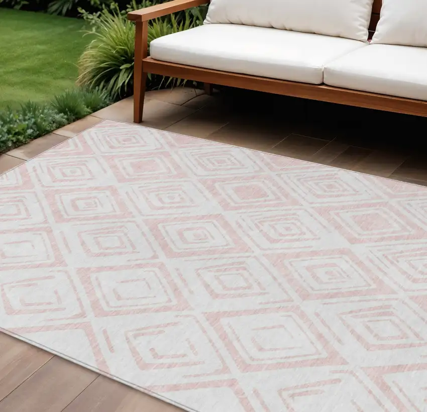 Pink And Ivory Geometric Washable Indoor Outdoor Area Rug Photo 1
