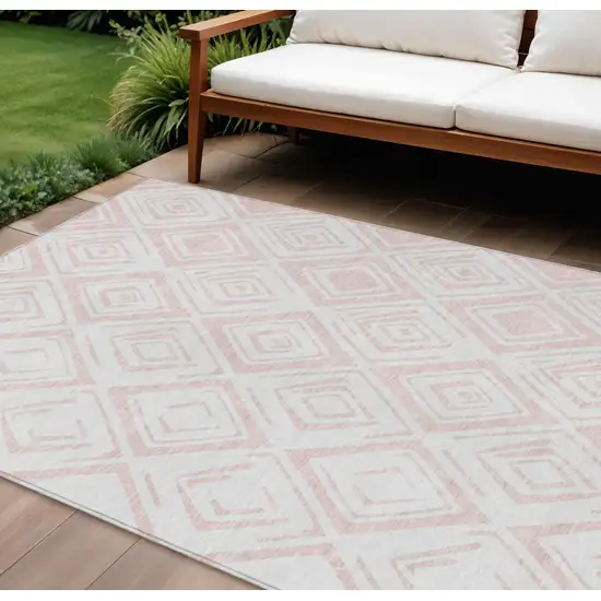 Pink And Ivory Geometric Washable Indoor Outdoor Area Rug Photo 1