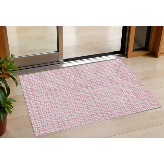 Pink And Ivory Geometric Washable Indoor Outdoor Area Rug Photo 1