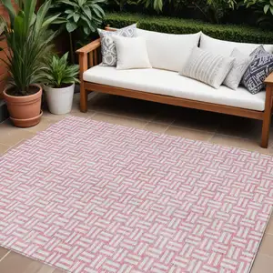 Photo of Pink And Ivory Geometric Washable Indoor Outdoor Area Rug