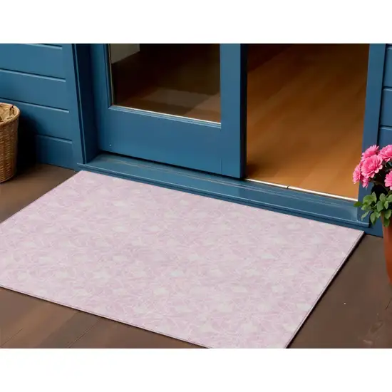 Pink And Ivory Geometric Washable Indoor Outdoor Area Rug Photo 1