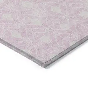 Photo of Pink And Ivory Geometric Washable Indoor Outdoor Area Rug