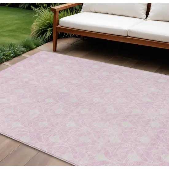 Pink And Ivory Geometric Washable Indoor Outdoor Area Rug Photo 1