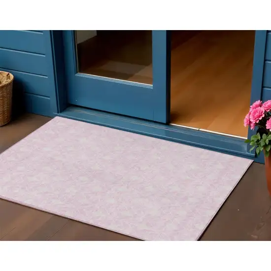 Pink And Ivory Geometric Washable Indoor Outdoor Area Rug Photo 1