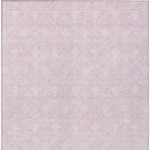 Photo of Pink And Ivory Geometric Washable Indoor Outdoor Area Rug