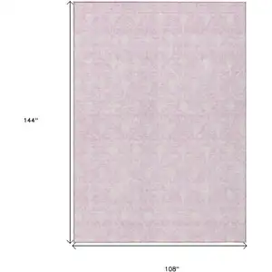 Photo of Pink And Ivory Geometric Washable Indoor Outdoor Area Rug