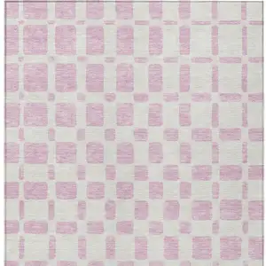 Photo of Pink And Ivory Geometric Washable Indoor Outdoor Area Rug