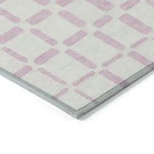 Photo of Pink And Ivory Geometric Washable Indoor Outdoor Area Rug
