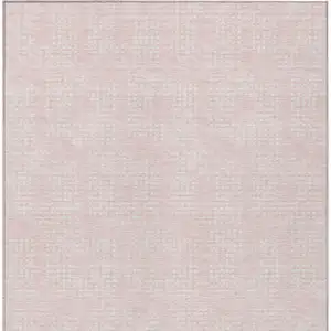 Photo of Pink And Ivory Geometric Washable Indoor Outdoor Area Rug