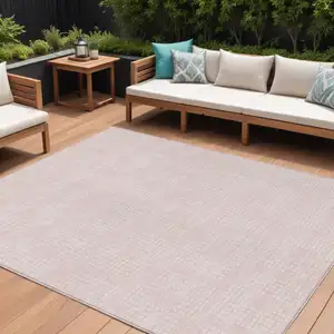 Photo of Pink And Ivory Geometric Washable Indoor Outdoor Area Rug