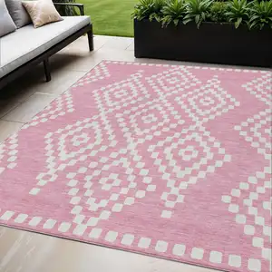 Photo of Pink And Ivory Geometric Washable Indoor Outdoor Area Rug
