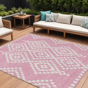 Photo of Pink And Ivory Geometric Washable Indoor Outdoor Area Rug