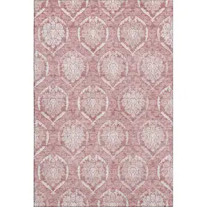 Photo of Pink And Ivory Medallion Washable Area Rug With UV Protection