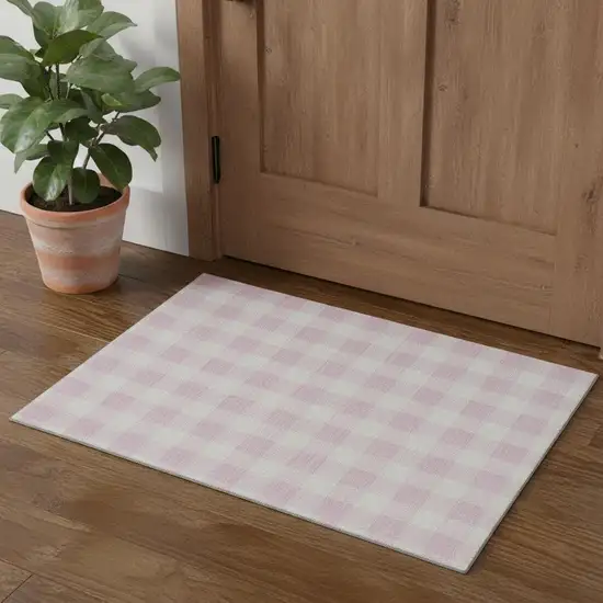 Pink And Ivory Plaid Washable Area Rug With UV Protection Photo 1