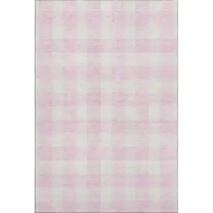 Photo of Pink And Ivory Plaid Washable Area Rug With UV Protection
