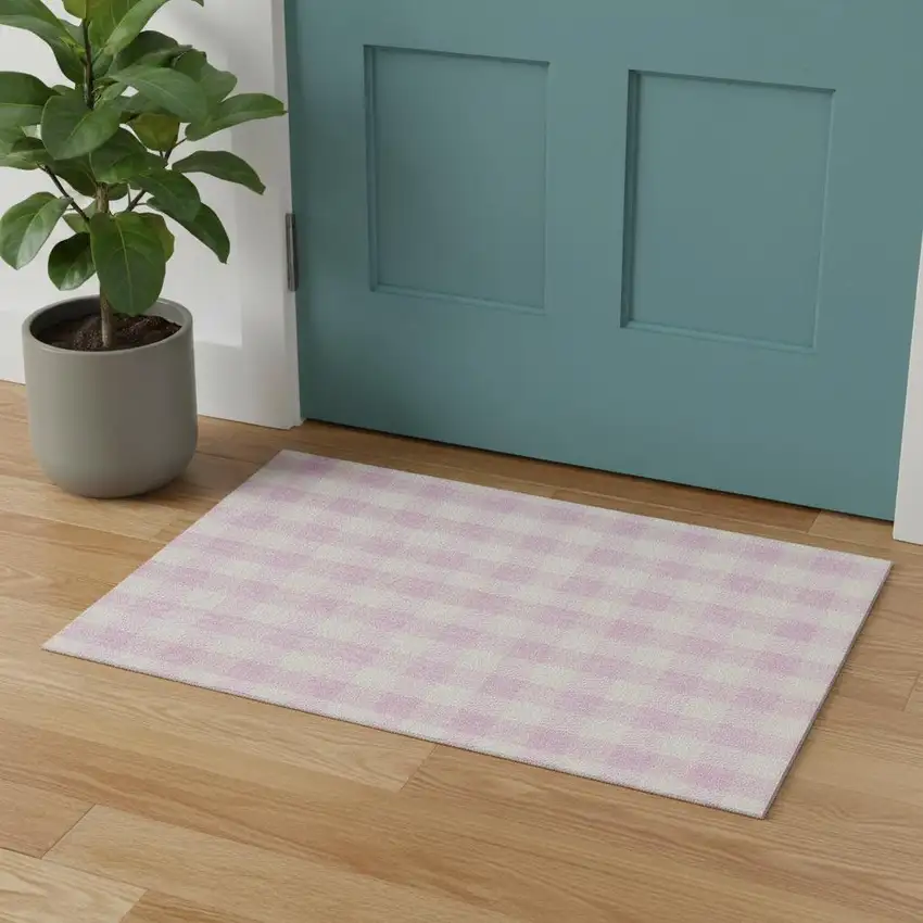 Pink And Ivory Plaid Washable Area Rug With UV Protection Photo 1