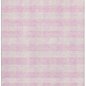 Photo of Pink And Ivory Plaid Washable Area Rug With UV Protection