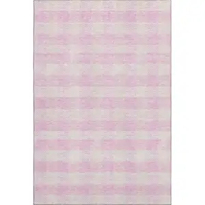 Photo of Pink And Ivory Plaid Washable Area Rug With UV Protection