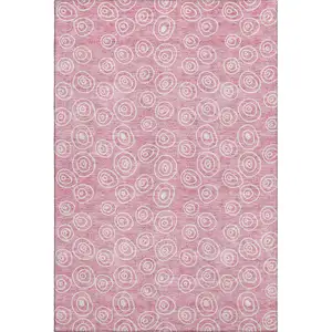 Photo of Pink And Ivory Polka Dot Washable Area Rug With UV Protection