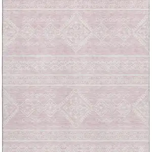 Photo of Pink And Ivory Southwestern Washable Area Rug With UV Protection