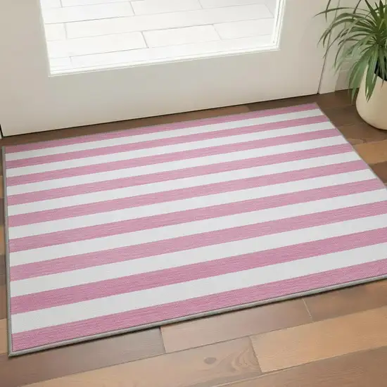 Pink And Ivory Striped Washable Area Rug With UV Protection Photo 2