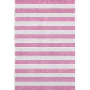 Photo of Pink And Ivory Striped Washable Area Rug With UV Protection