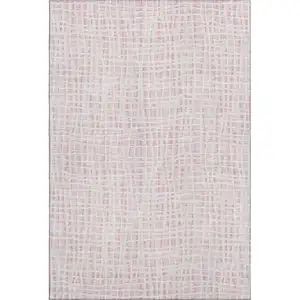 Photo of Pink And Ivory Striped Washable Area Rug With UV Protection