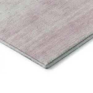 Photo of Pink And Ivory Striped Washable Area Rug With UV Protection