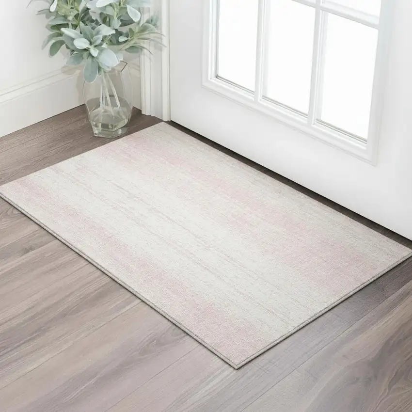 Pink And Ivory Striped Washable Area Rug With UV Protection Photo 1