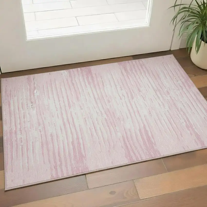 Pink And Ivory Striped Washable Area Rug With UV Protection Photo 1