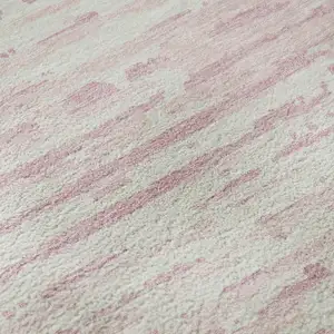Photo of Pink And Ivory Striped Washable Area Rug With UV Protection